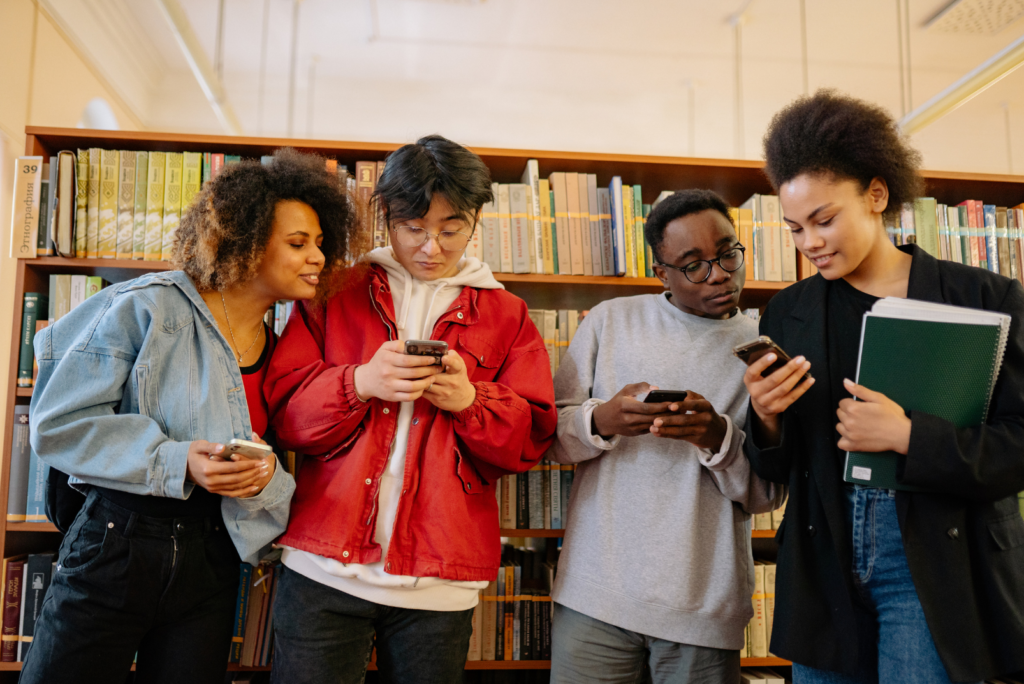 Students using smartphones for a GPS-based outdoor education activity